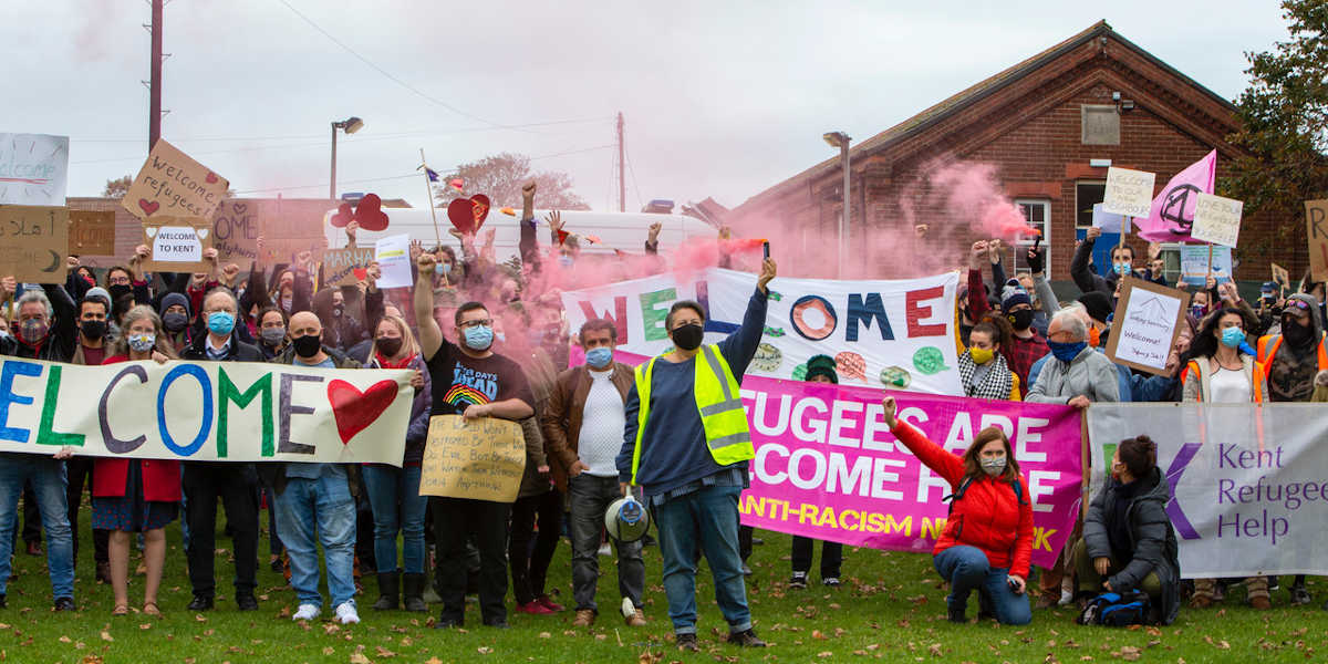 A rally held in support of migrants coming across the English Channel in Folkestone, Kent