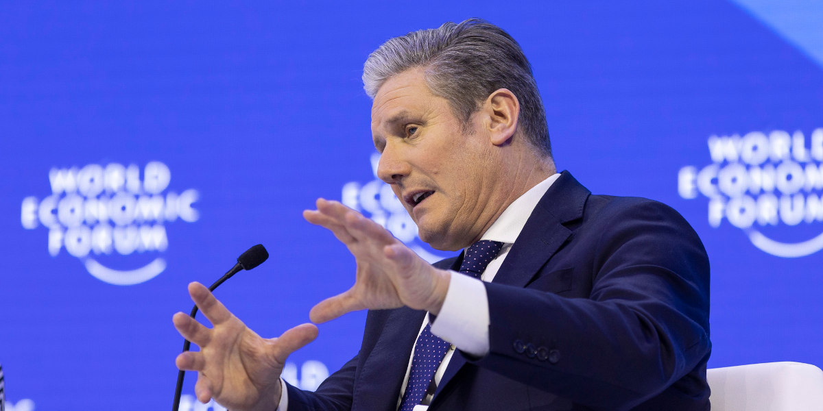 Keir Starmer – a white man in a blue suit – speaking at the World Economic Forum in 2023