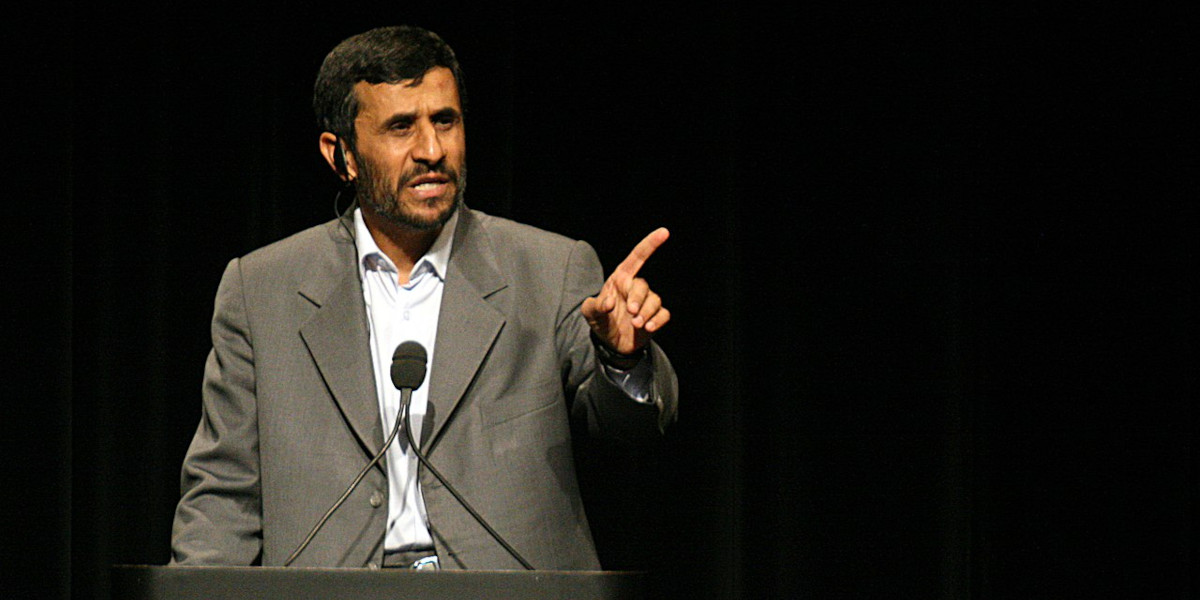Former President of Iran Mahmoud Ahmadinejad speaking from a podium at Columbia University