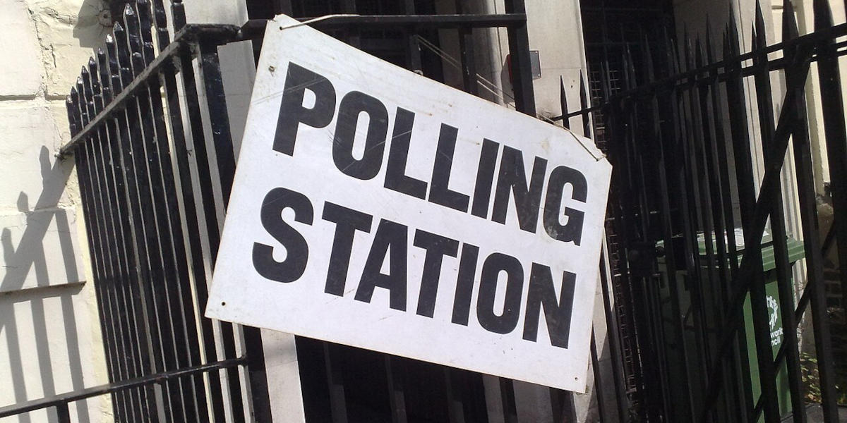 A photo of a polling station sign