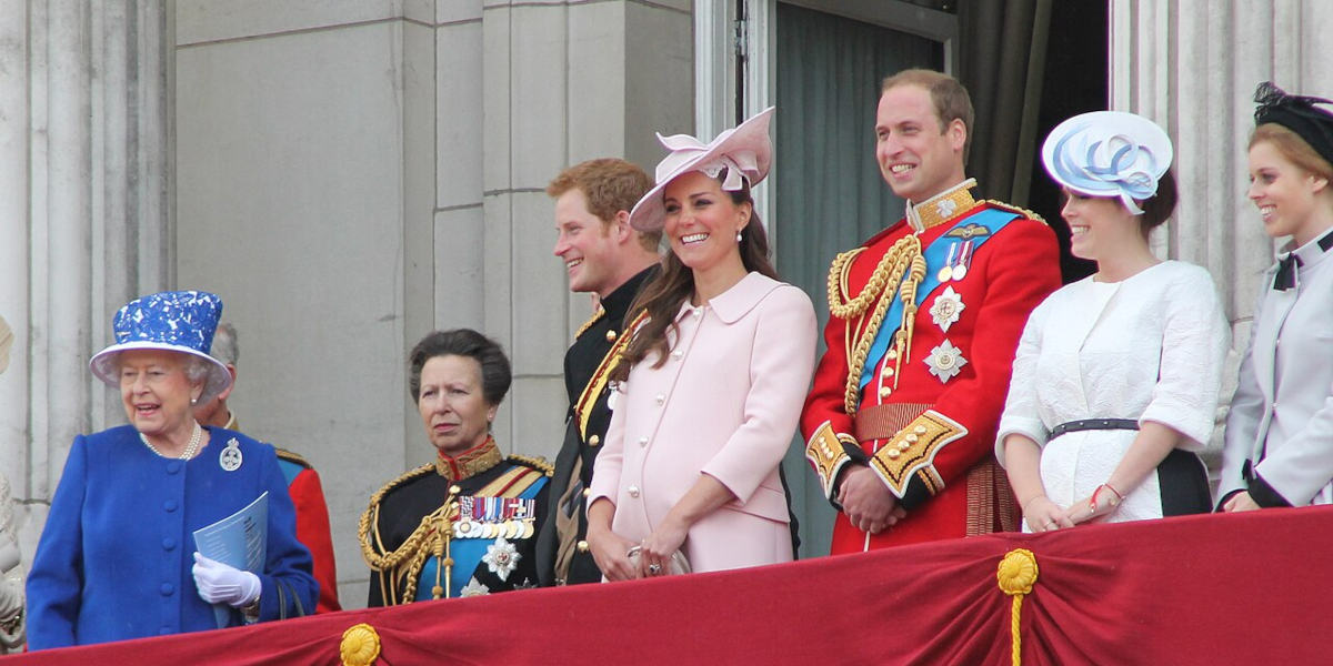 From left to right: Queen Elizabeth II, Princess Anne, Prince Harry, the Princess of Wales, Prince Edward, Princess Euginie and Princess Beatrice on the balcony at Buckingham Palace