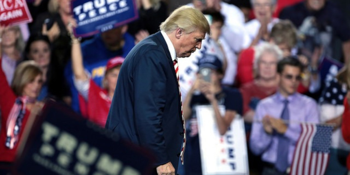 Donald Trump walks off stage at a 2016 election campaign rally